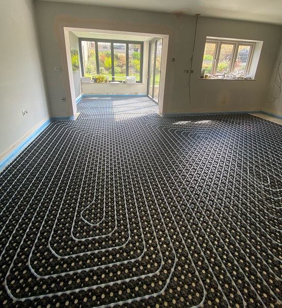 Case Study | Keeping warm from the floor upwards with underfloor heating -  Grant UK
