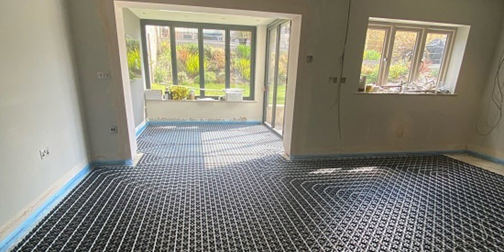 Keeping warm from the floor upwards with Grant underfloor heating