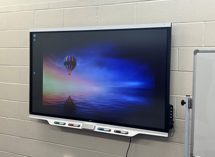 Grant UK donate interactive smart screen to local school