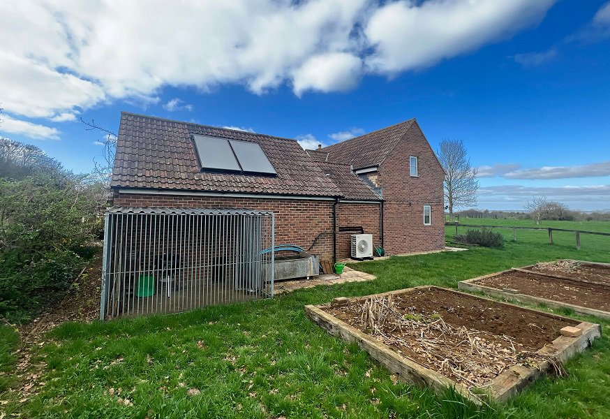 The 10kW Aerona3 heat pump installation is complete at the farmhouse