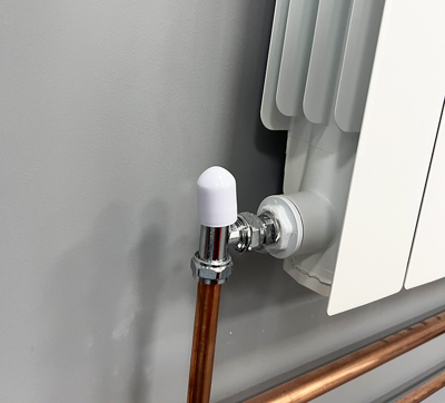 Lockshield valve fitted to radiator