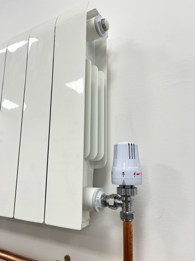 Thermostatic radiator valve fitted to radiator