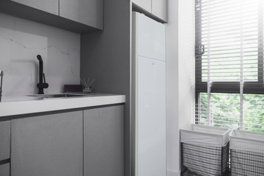 Grant integrated hot water cylinder installed in utility room