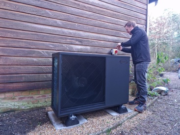 Tom Newman checking his Aerona 290 heat pump installation