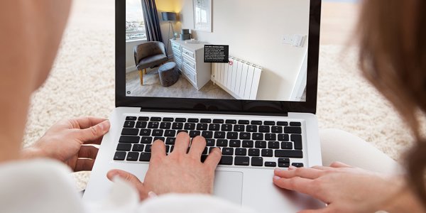Couple Looking At Grant House Web