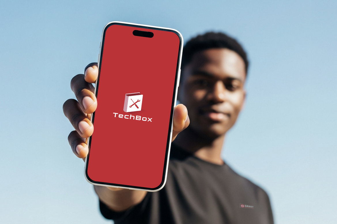 Techbox, man holding phone.jpg